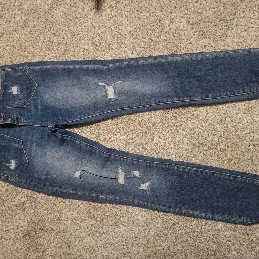 Distressed Blue Jeans